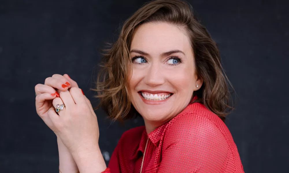 Headshot of Heidi Stober. A woman with chin length hair smiling and looking to her left.