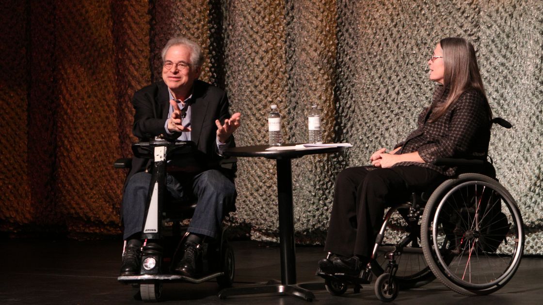 Itzhak Perlman and Marca Bristo engage in conversation on the Harris stage