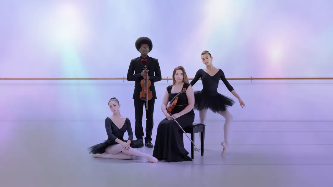 Two student dancers pose with two student musicians