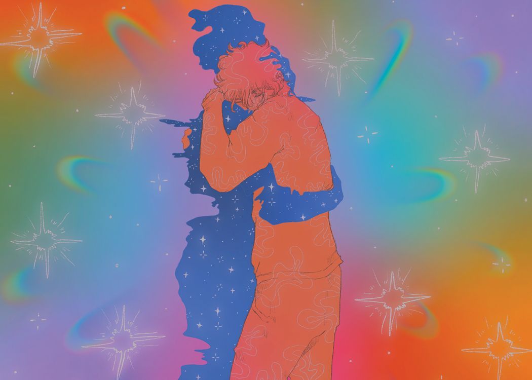 Silhouettes of  two people embracing with a rainbow cloudy background