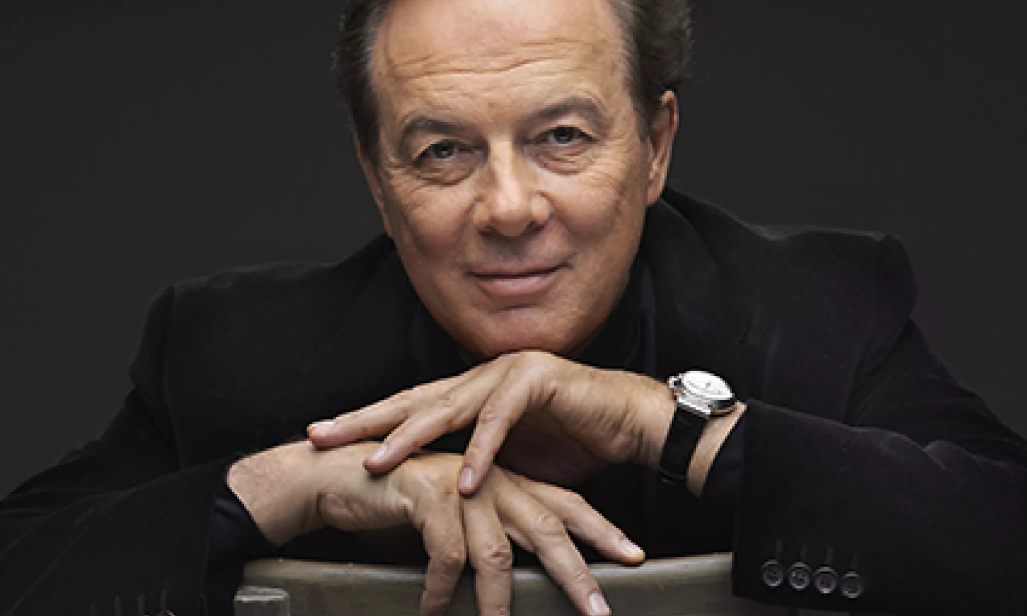 Fernuccio Furlanetto sitting on a chair