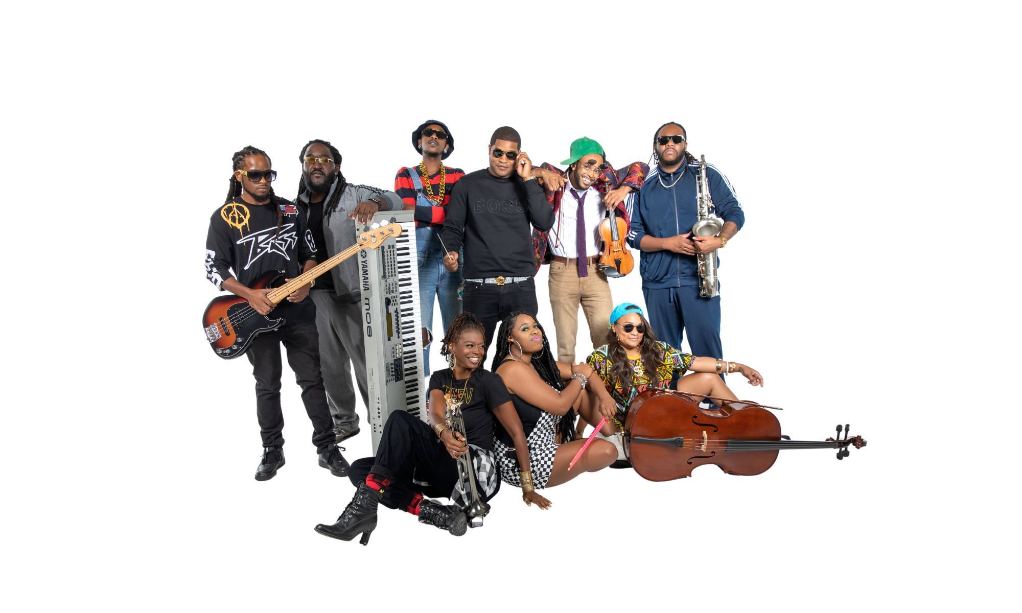 A group of musicians pose with various instruments such as a keyboard, a guitar, a violin, a saxophone, a cello, and a trumpet. 