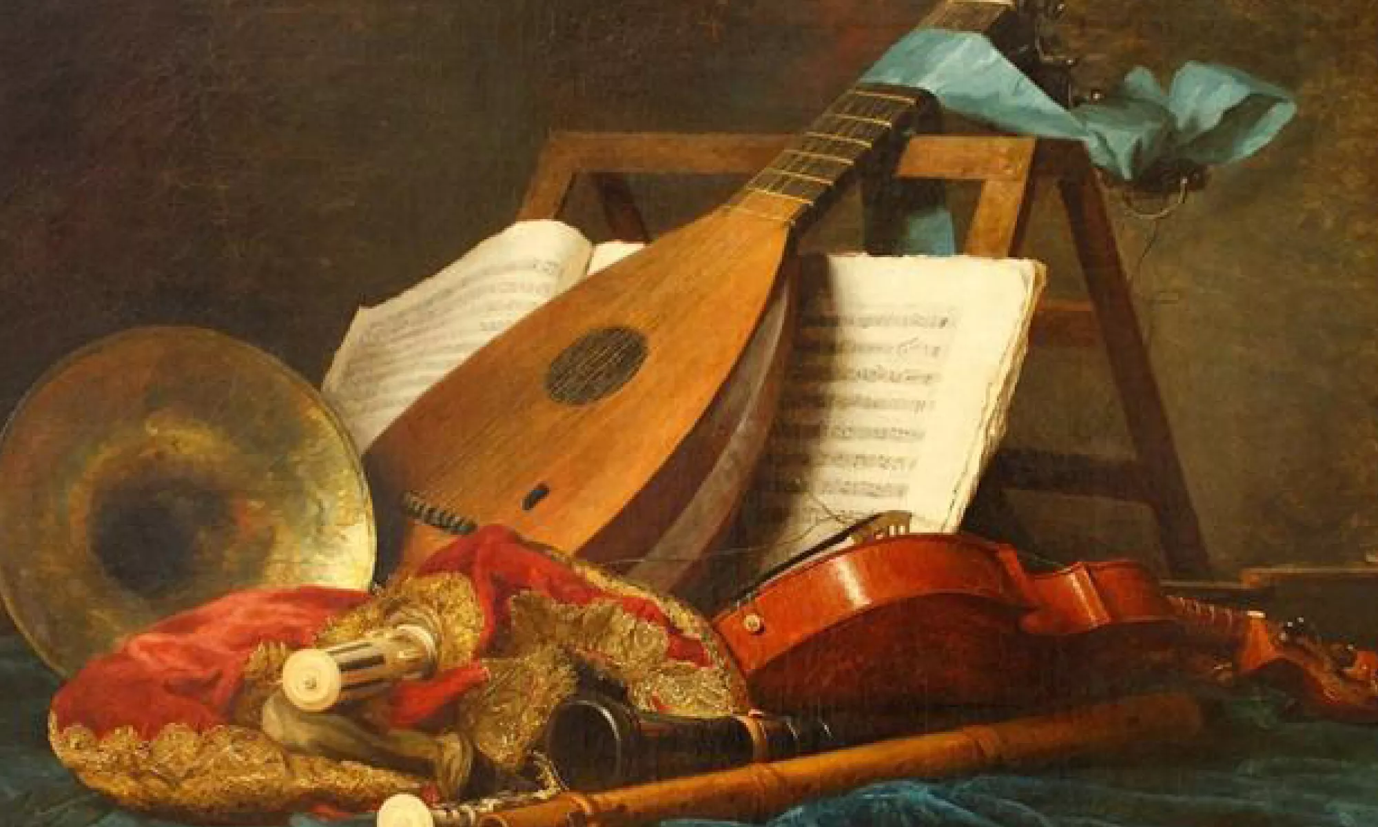 Image of a lute resting against sheet music surrounded by a violin, oboe, and other instruments