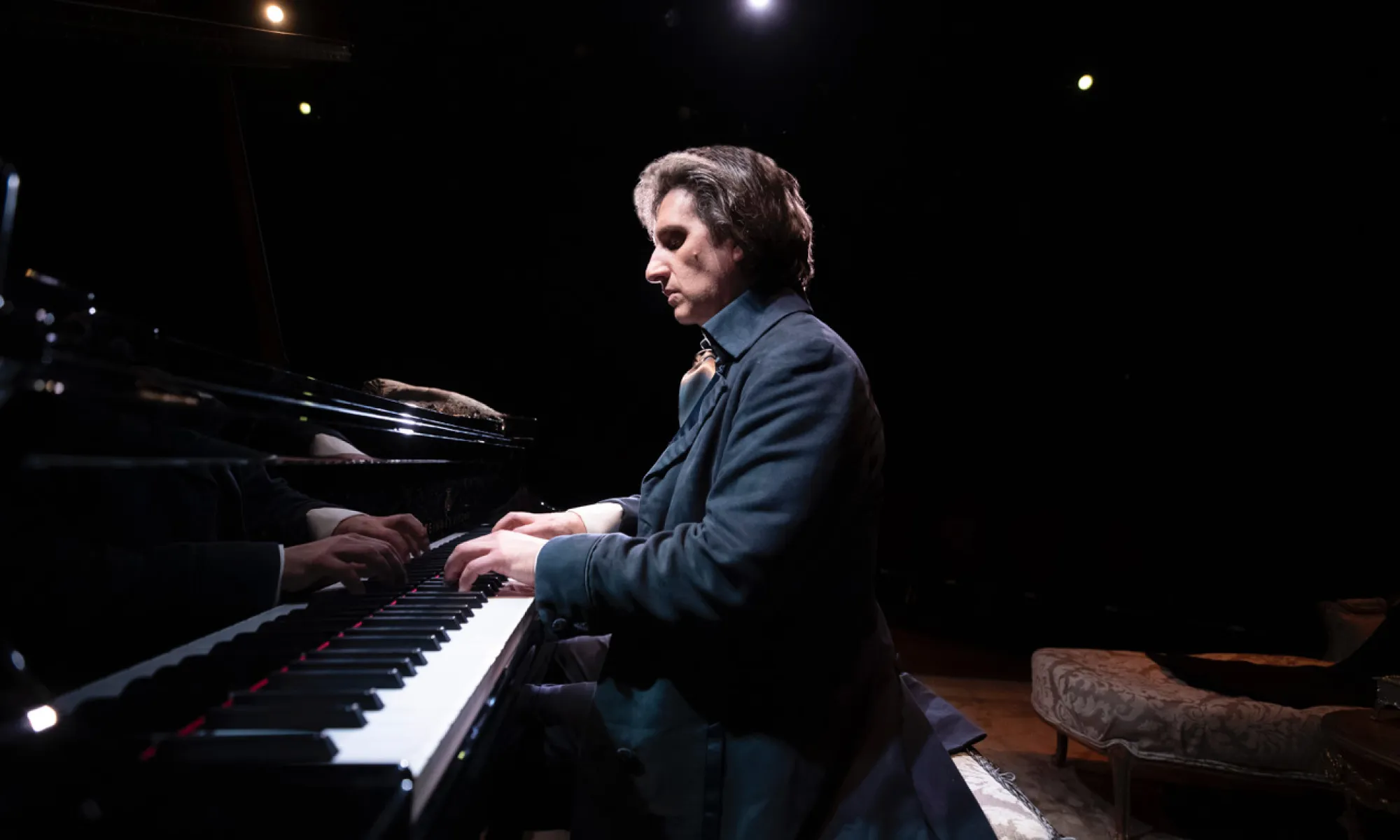 A man playing the piano.
