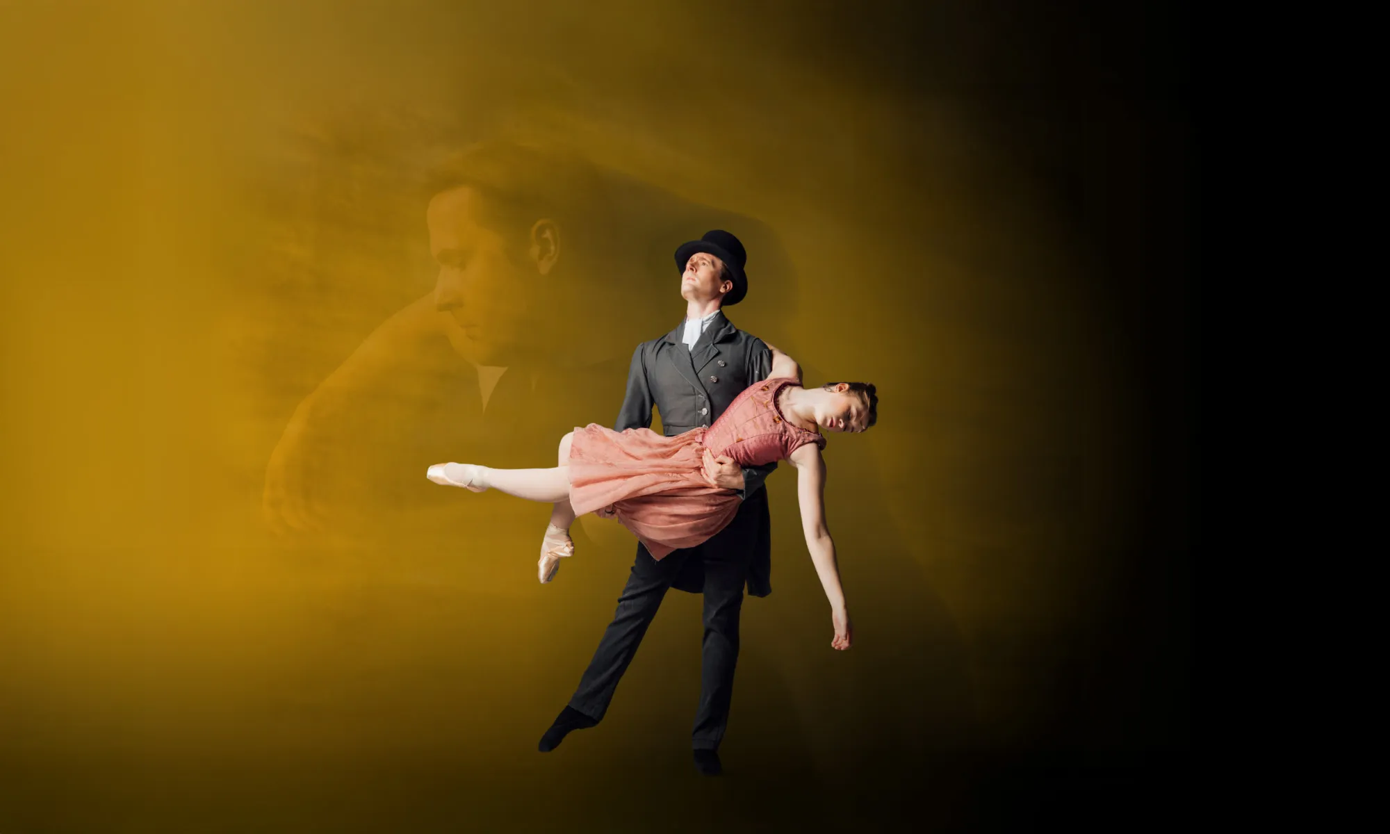 Dancer dressed as Edgar Allan Poe with top hat holds dying ballerina arm down with coral dress.