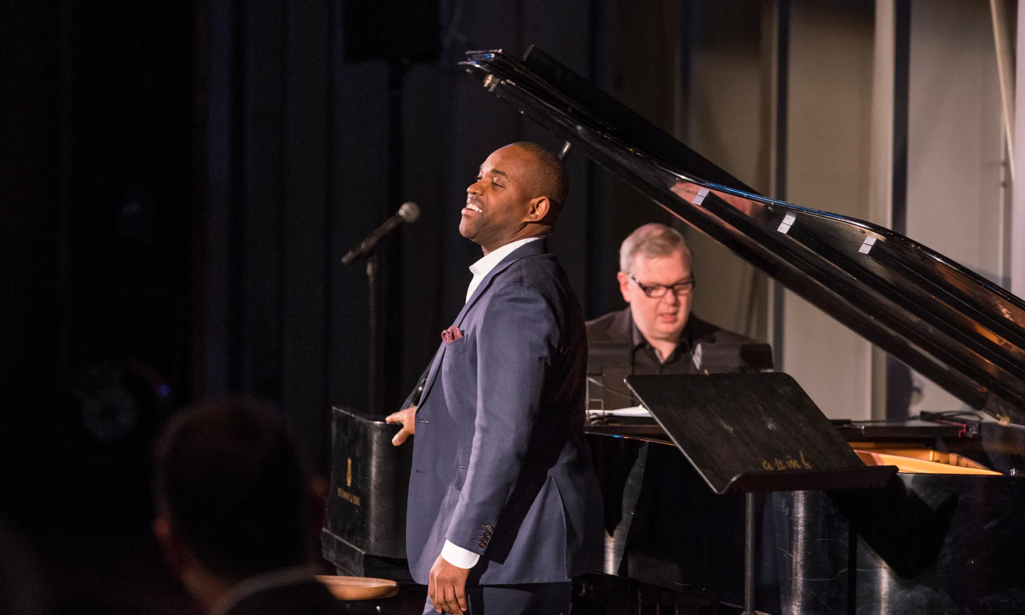Lawrence Brownlee performing with Craig Terry in front of an audience.