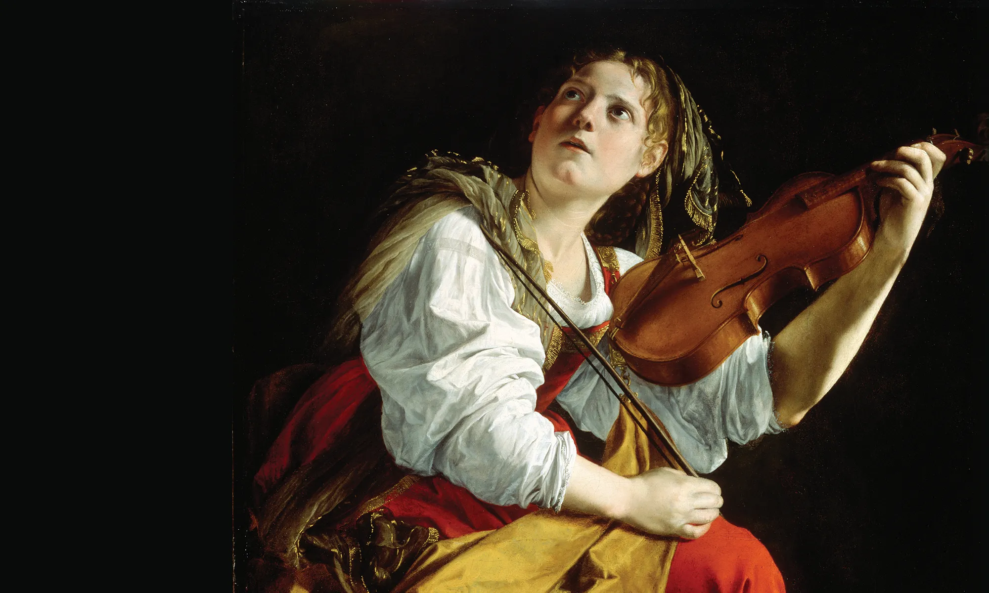 a woman holding a violin