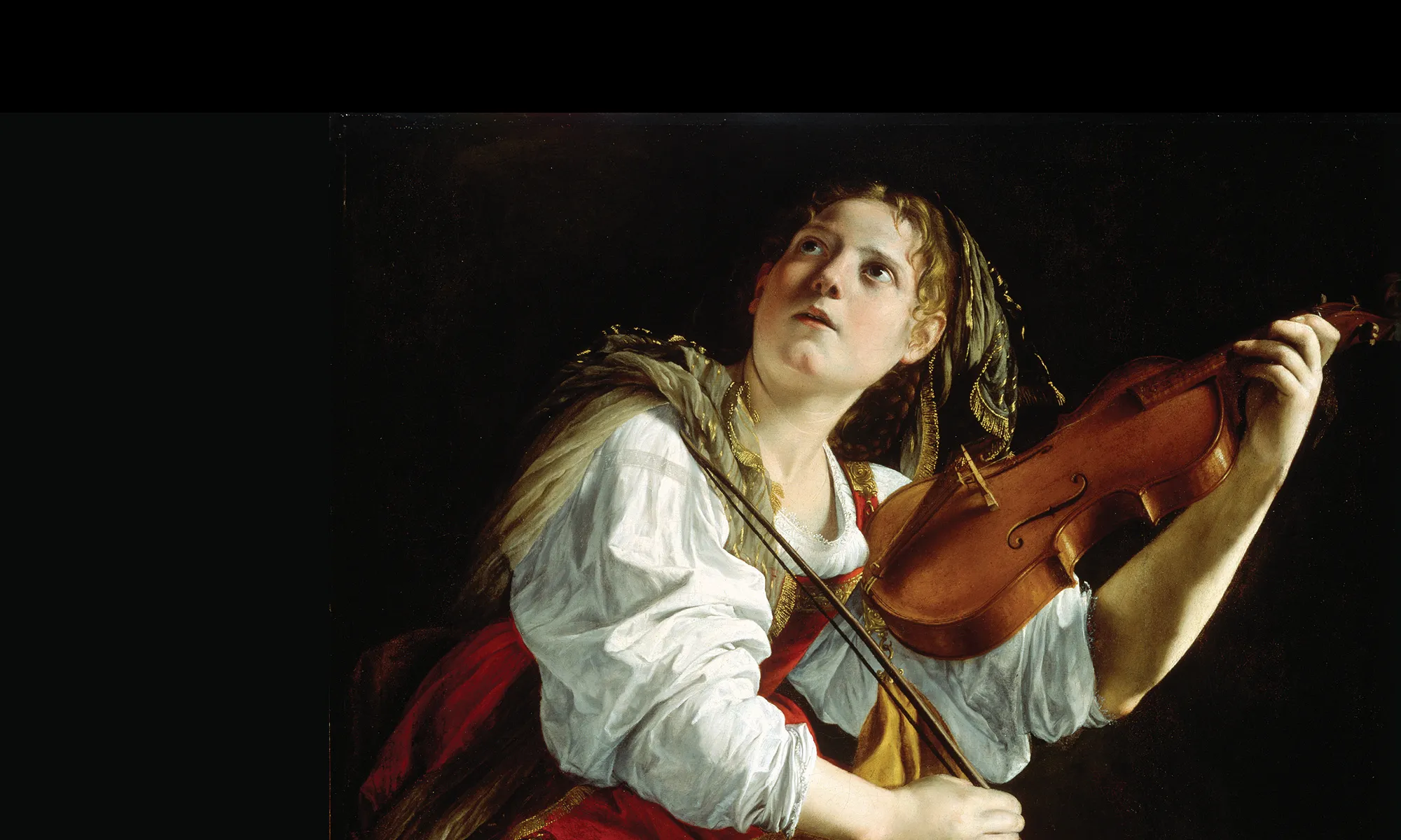a woman holding a violin