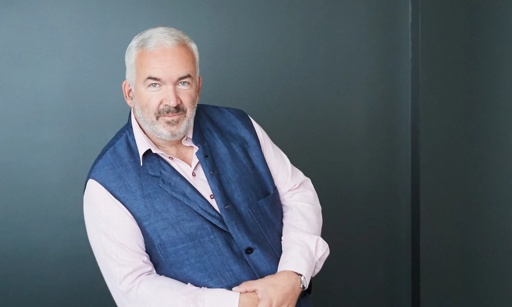 Conductor Marc Minkowski in a blue vest