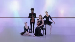 Two student dancers pose with two student musicians
