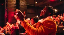 The audience at the Harris giving a performance a standing ovation.