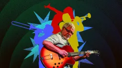 At the center of the image, musician and curator Fareed Haque plays a guitar. Behind him are silhouette illustrations of artists and dancers performing. 