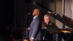 Lawrence Brownlee performing with Craig Terry in front of an audience.