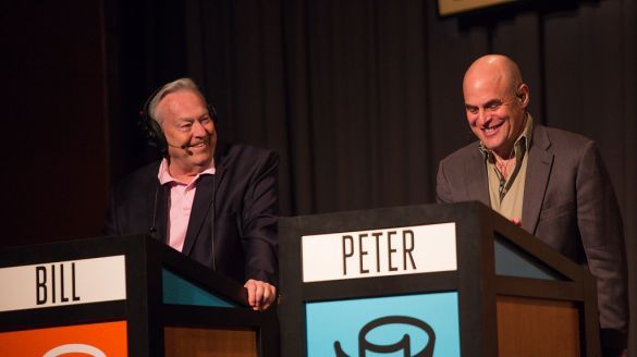 Bill Curtis and Peter Sagal at their podiums