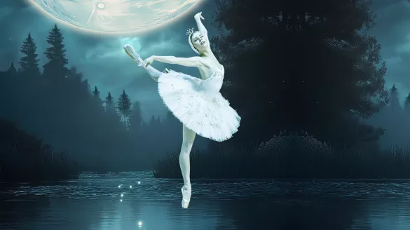 A ballerina in penché position. A lake and forest during a full moon serve as background.
