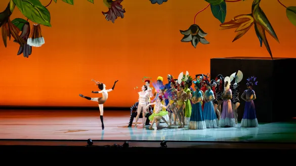 An ensemble of performers playing an assortment of instruments.