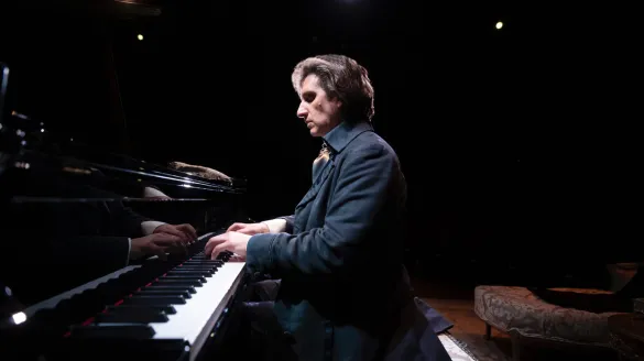 A man playing the piano.