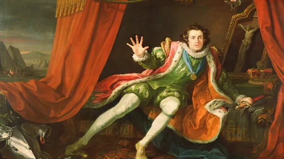 a man in opulent renaissance clothes with his hand out
