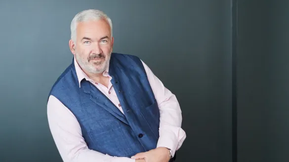 Conductor Marc Minkowski in a blue vest