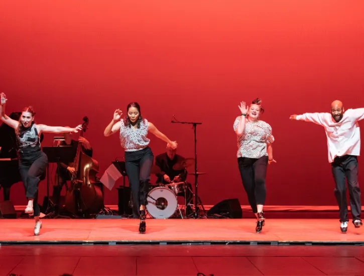 Four tap dancers performing.